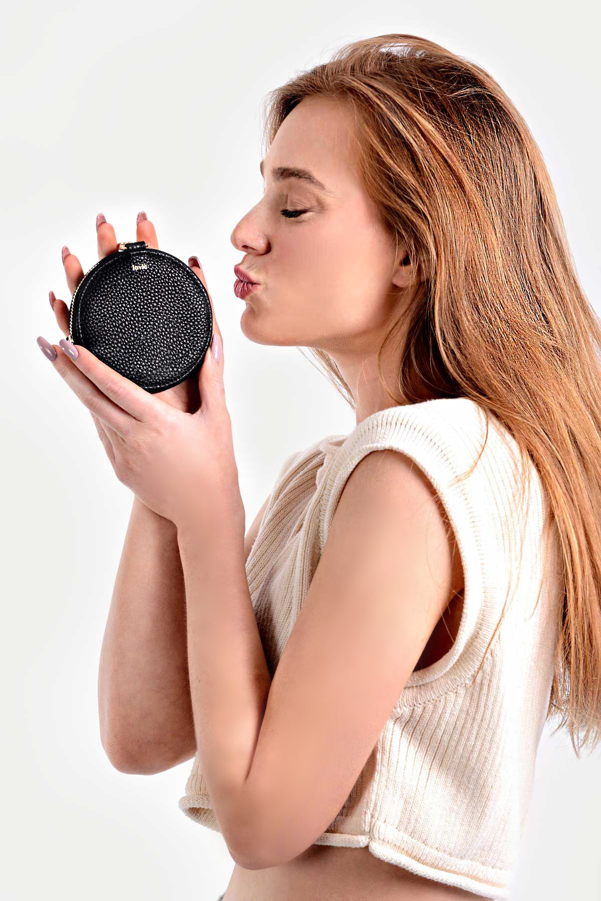 ארנק עגול לכרטיסי אשראי ומטבעות