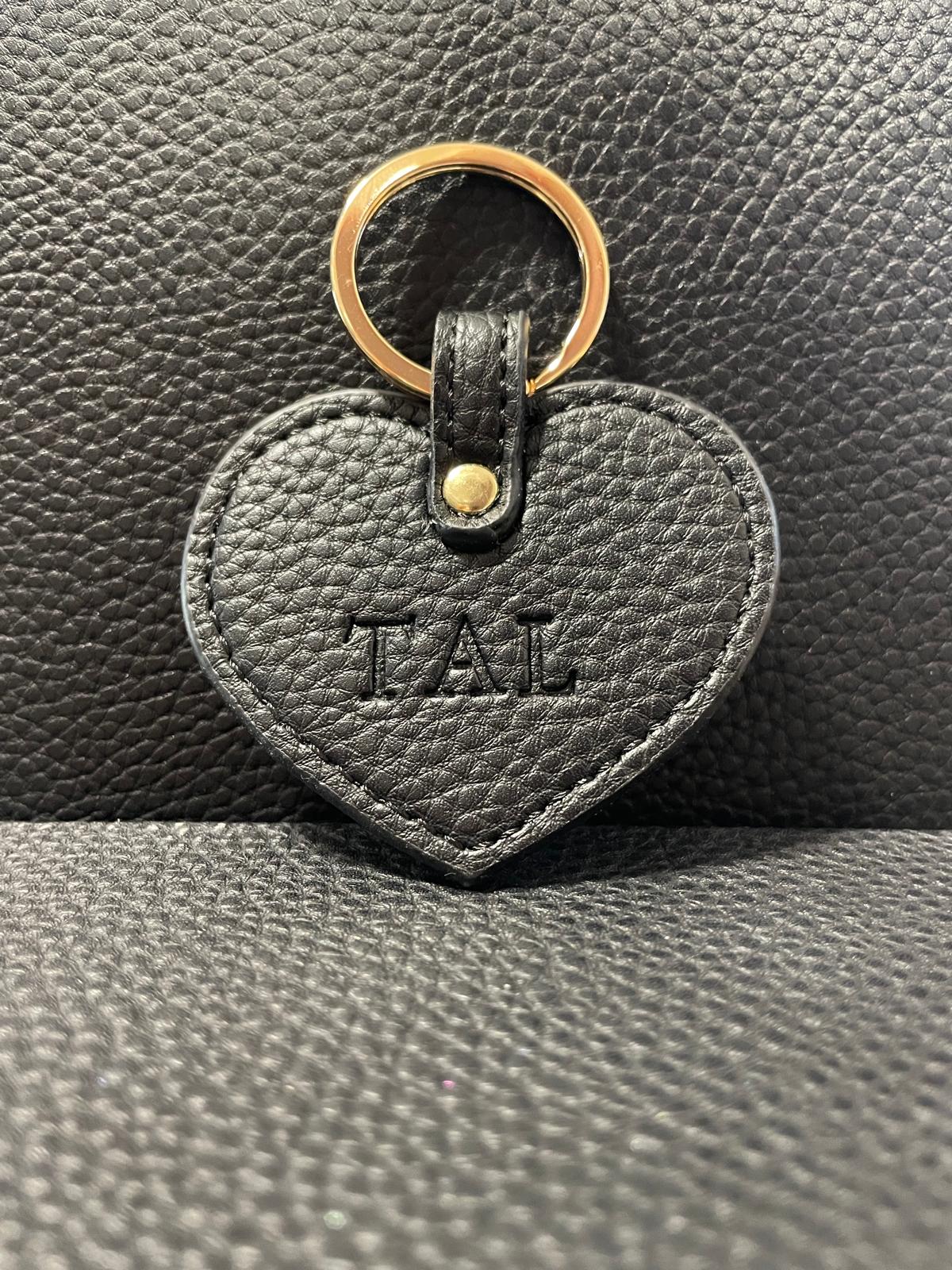 OUTLET - מחזיק מפתחות בגוון שחור עם הטבעה ללא צבע TAL