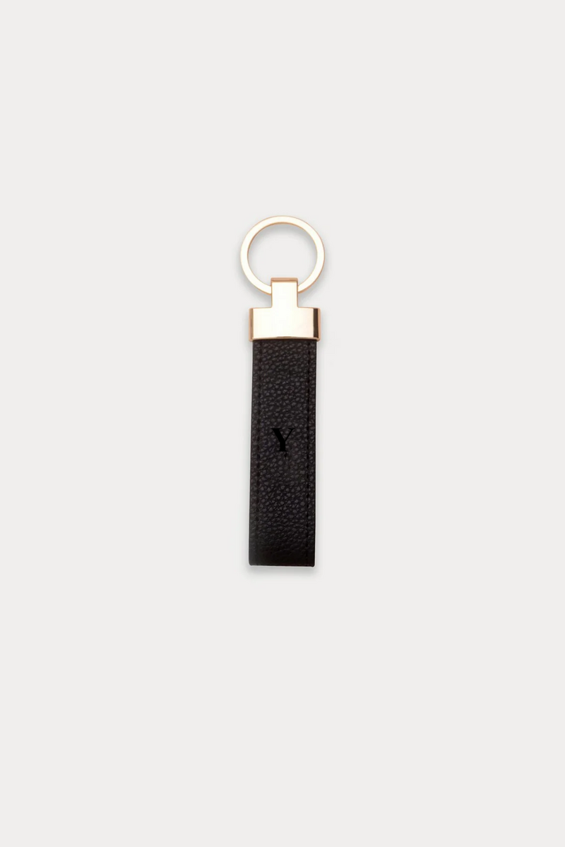 OUTLET - מחזיק מפתחות בגוון שחור-זהב עם הטבעה ללא צבע Y